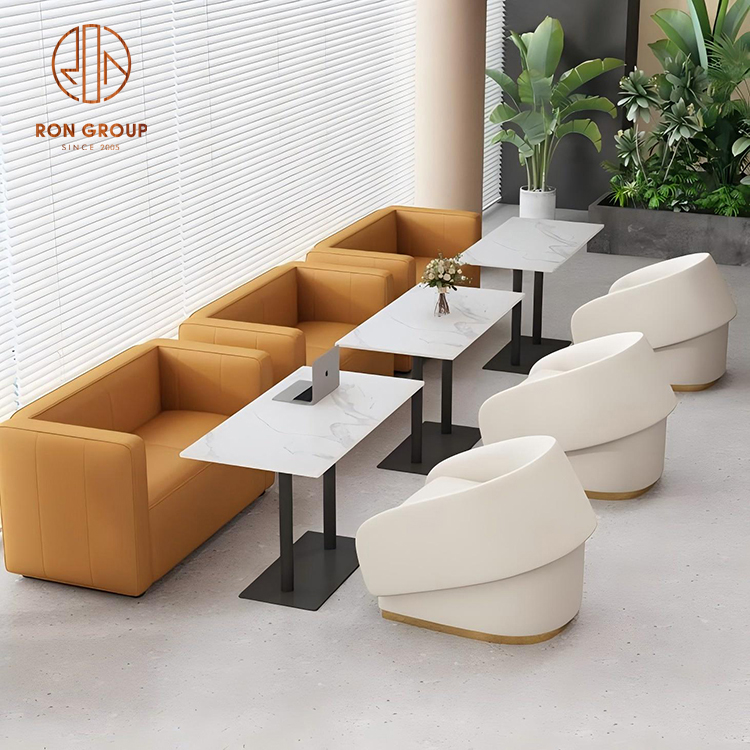 Modern Cafe Seating Set with Orange Leather Sofa, Armchairs and Marble Top Tables