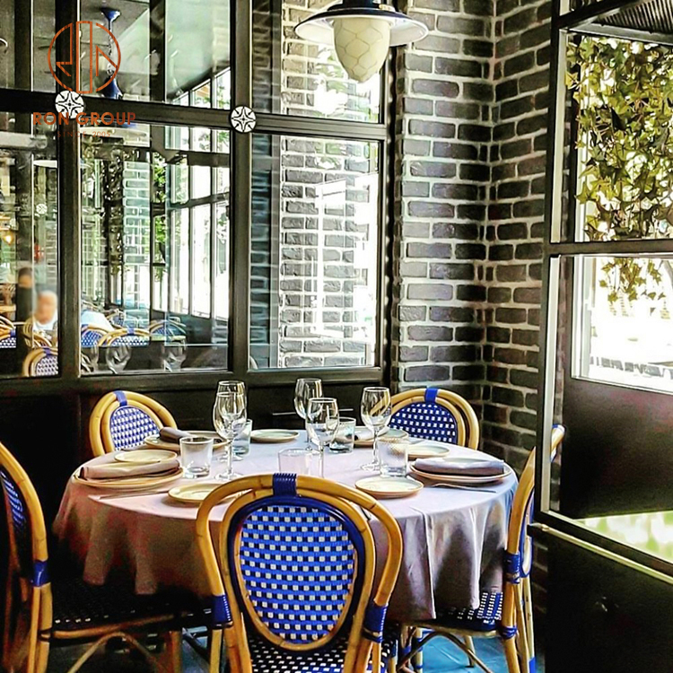 Bistro Dining Furniture Set with Fabric Bench Seating and Woven Rattan Chairs