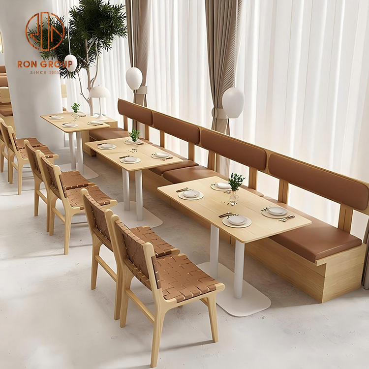 Wood Frame Cafe Booth Seating with Brown Leather Cushions and Dining Tables