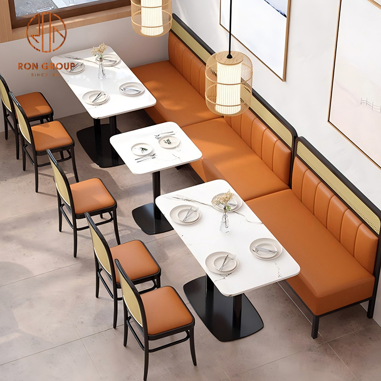 Brown Leather Booth Seating with Rattan Back and Marble Tables for Coffee Shops