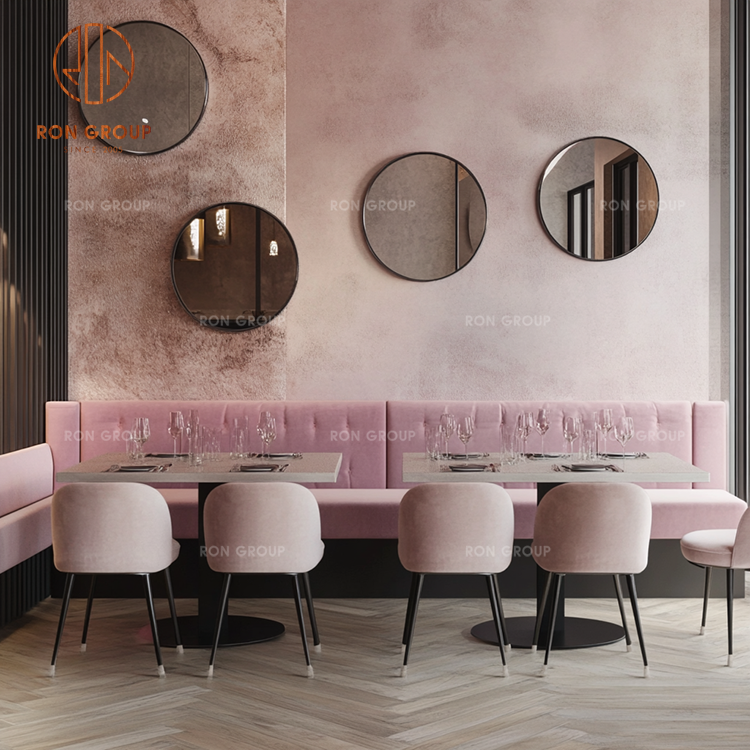 Modular Pink Upholstered Banquette with Marble-Top Dining Tables and Blush Velvet Chairs for Boutique Restaurants