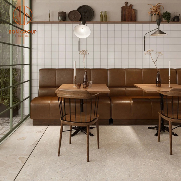 Wood Grain Dining Tables with Leather Booth Seating and Cafe Chairs