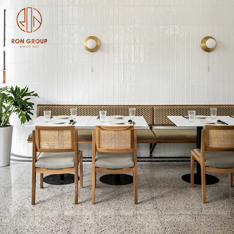 Modern Restaurant Furniture Marble Cafe Dining Tables with Woven Back Chairs and Fabric Booth Seating
