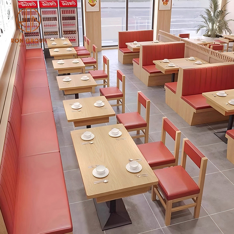 Commercial Restaurant Booth Seating with Red Upholstered Benches and Wooden Dining Tables