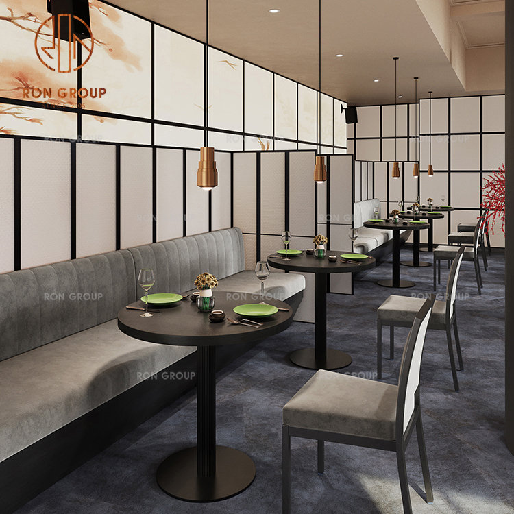 Black Round Restaurant Tables with Gray Fabric Banquette Seating for Modern Dining Layouts