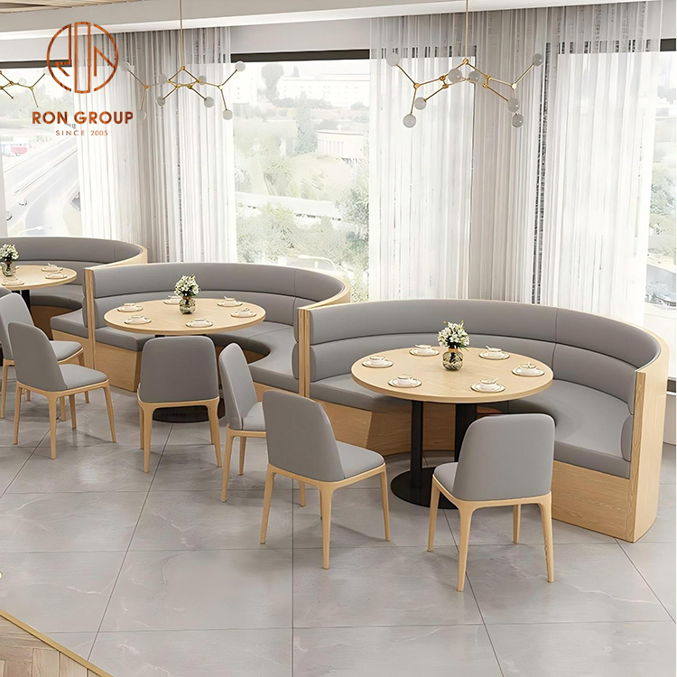 Curved Grey Banquette Booth with Wood Frame, Round Dining Tables & Matching Café Chairs for Restaurant Seating