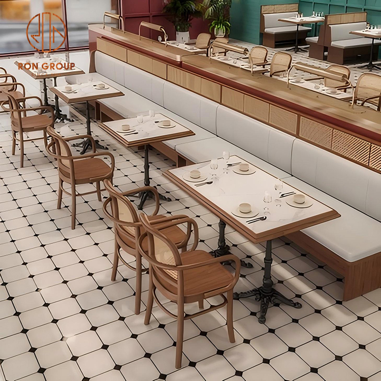 Square Marble Tables with Rattan Chairs and Leather Booth Seating for Cafe