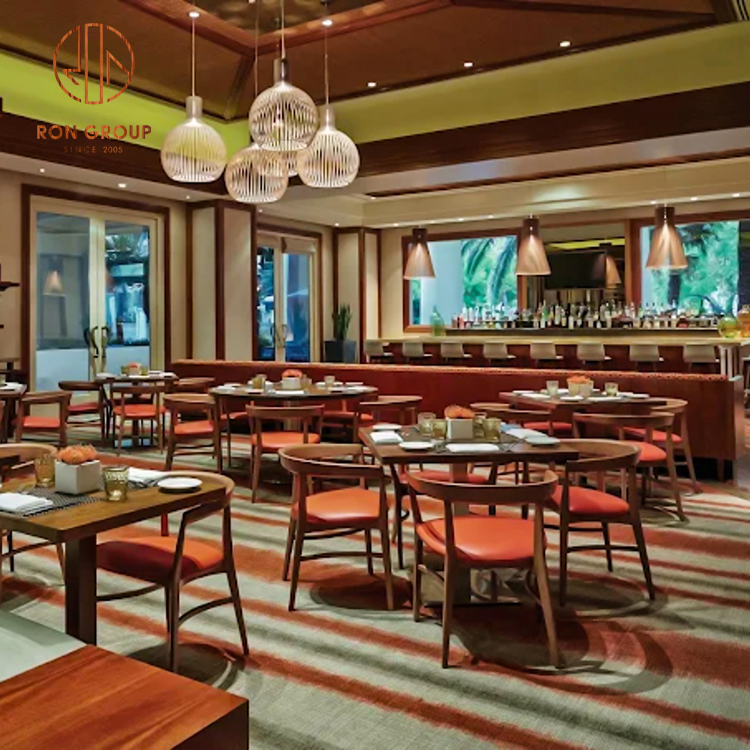 Wood Dining Tables with Orange Leather Café Chairs for Contemporary Restaurant Interiors