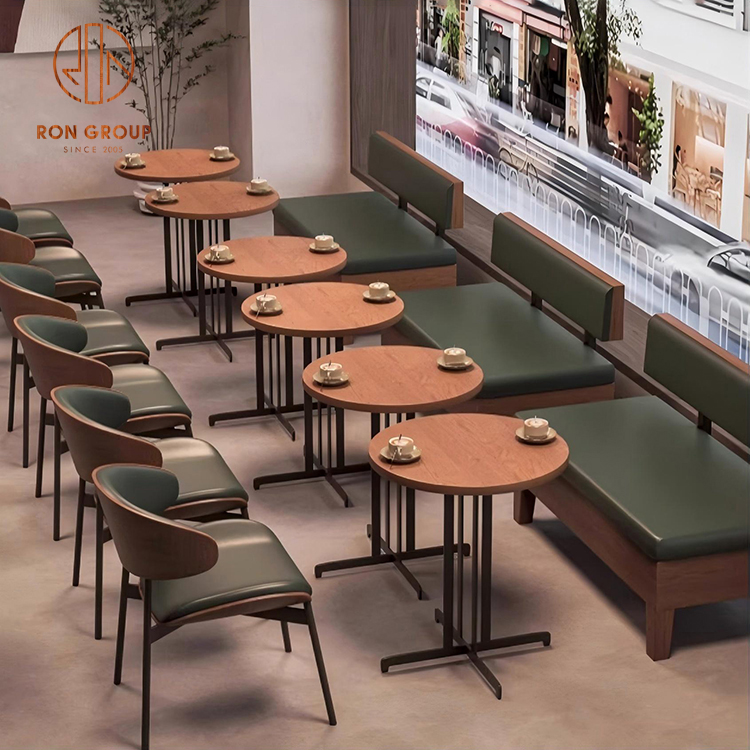 Modern Green Upholstered Bench Seating with Round Wood Café Tables & Matching Leather Dining Chairs on Metal Bases